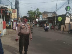 Polsek Rancasari Melaksanakan Pengaturan Lalu Lintas Siang Hari Demi Kelancaran Pengguna Jalan